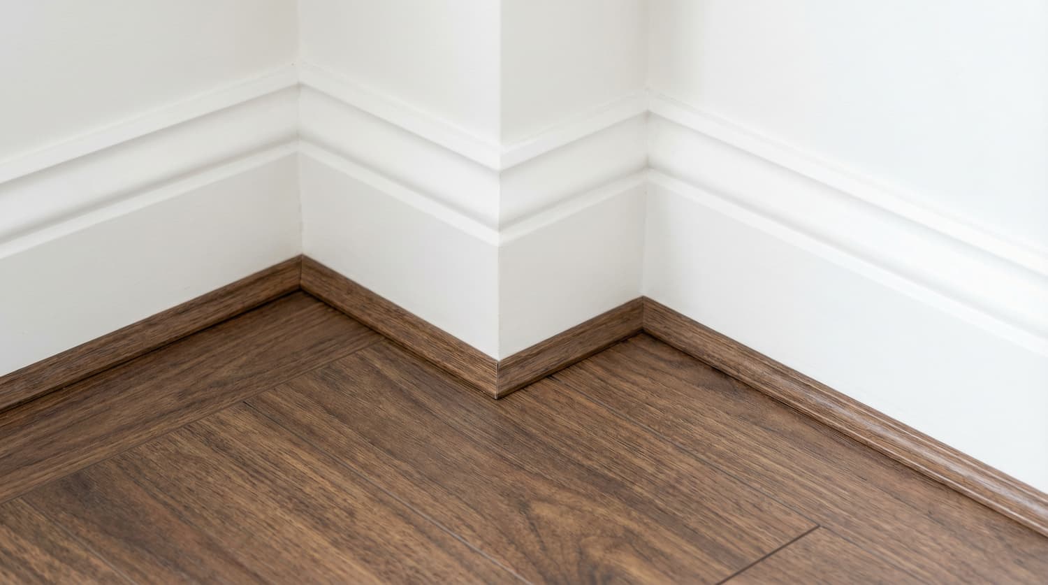Close-up of flooring and skirting board finishing detail